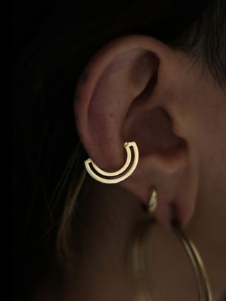 The Double Front ring in a conch piercing