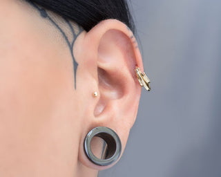 a wide helix piercing clicker ring in 14k