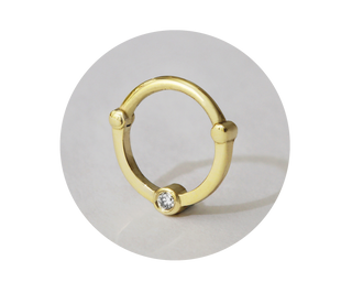 solid gold and diamond piercing