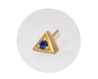a tiny gold geometric stud earring- gold and Sapphire 